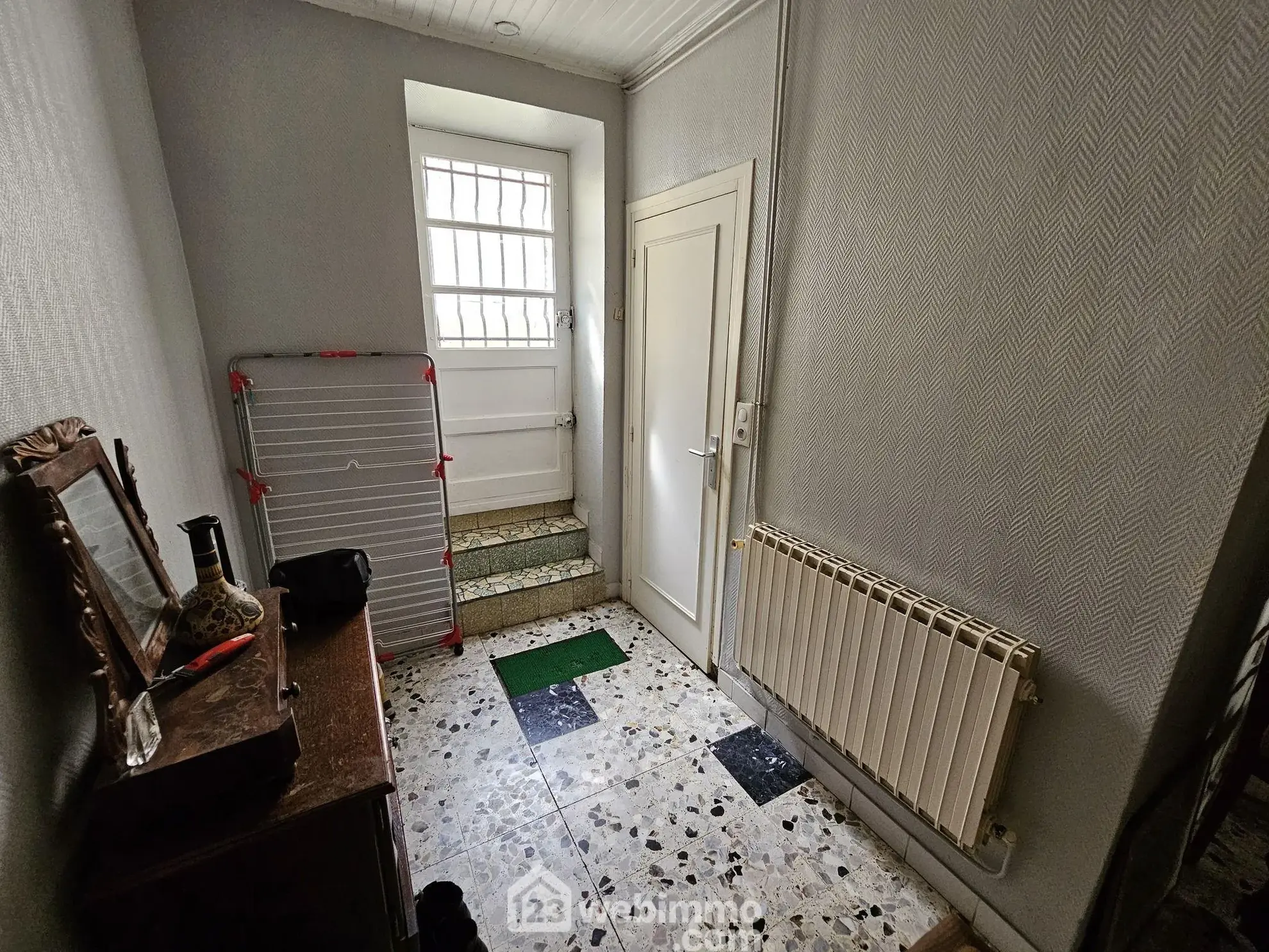 Maison de ville à Veneux-Les-Sablons avec jardin et potentiel de rénovation 