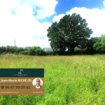 Terrain constructible de 2465 m² à Jolimetz avec façade de 40 m et dénivelé favorable
