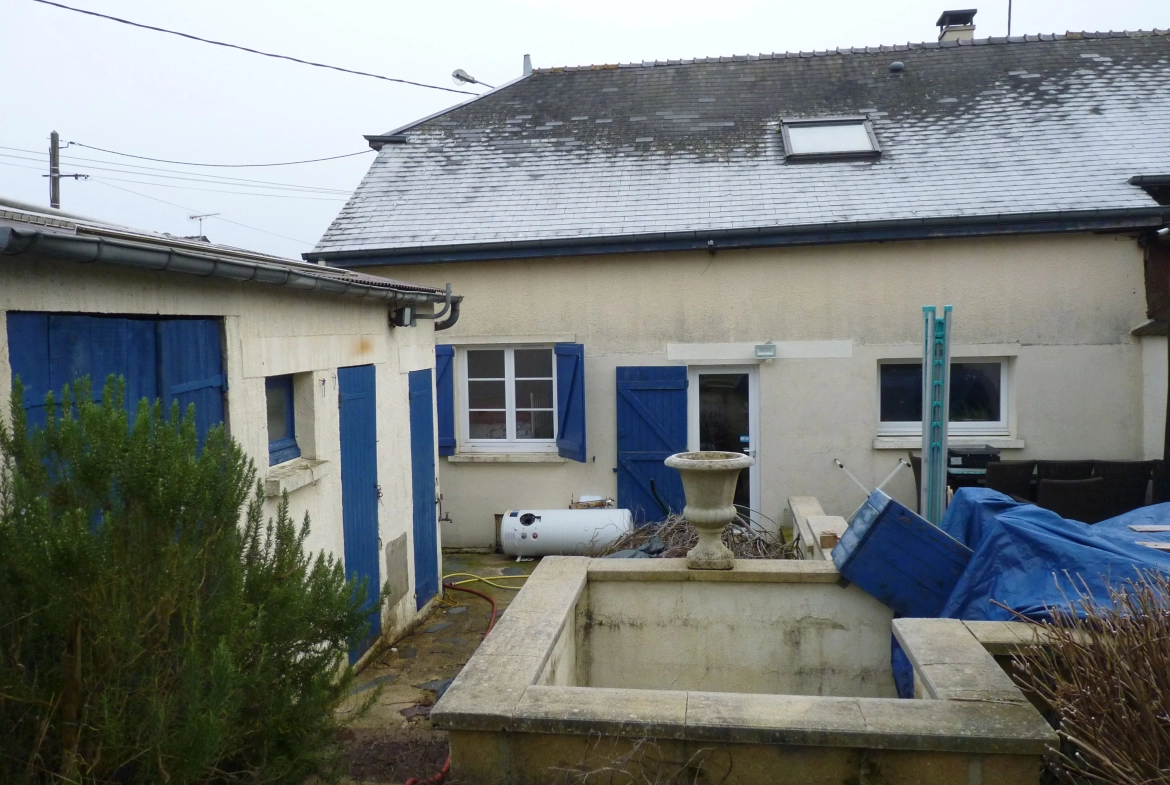 Maison de 100 m² avec 3 chambres et garage à Écly 