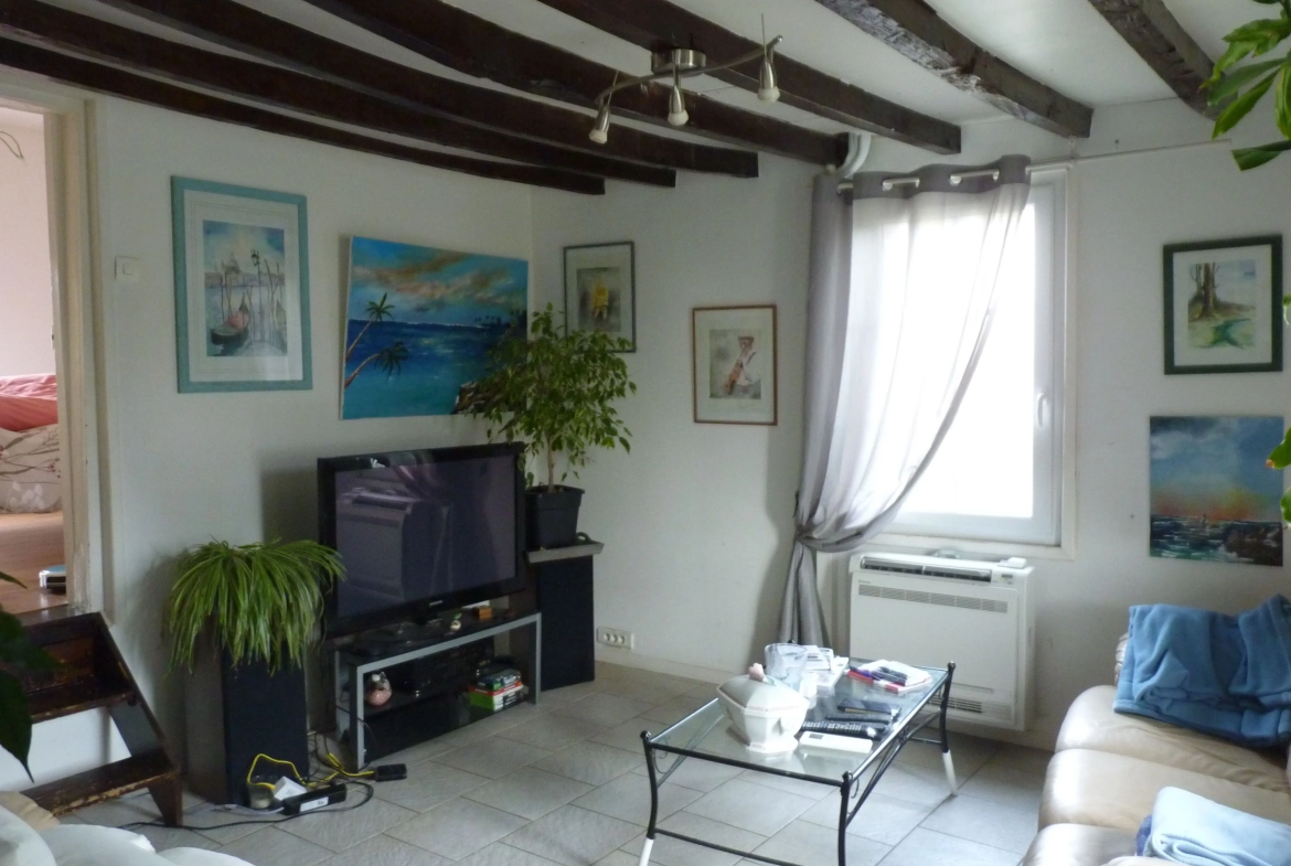 Maison de 100 m² avec 3 chambres et garage à Écly 