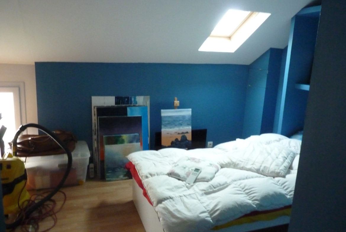 Maison de 100 m² avec 3 chambres et garage à Écly 