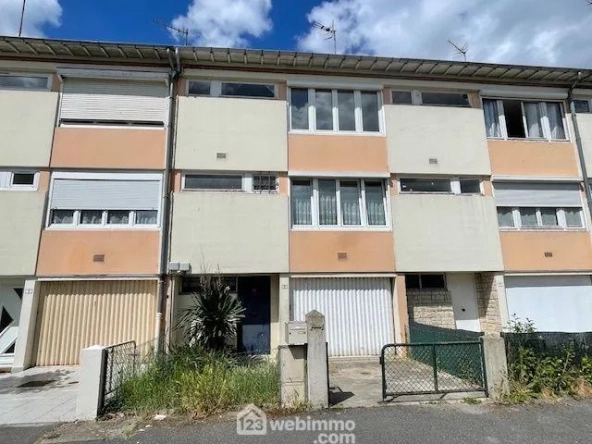 Maison de ville à Noyon avec jardin – Opportunité à rénover