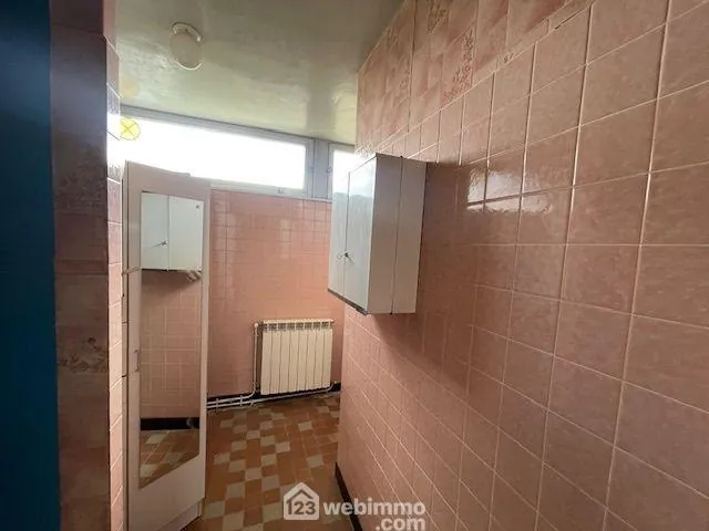 Maison de ville à Noyon avec jardin – Opportunité à rénover 