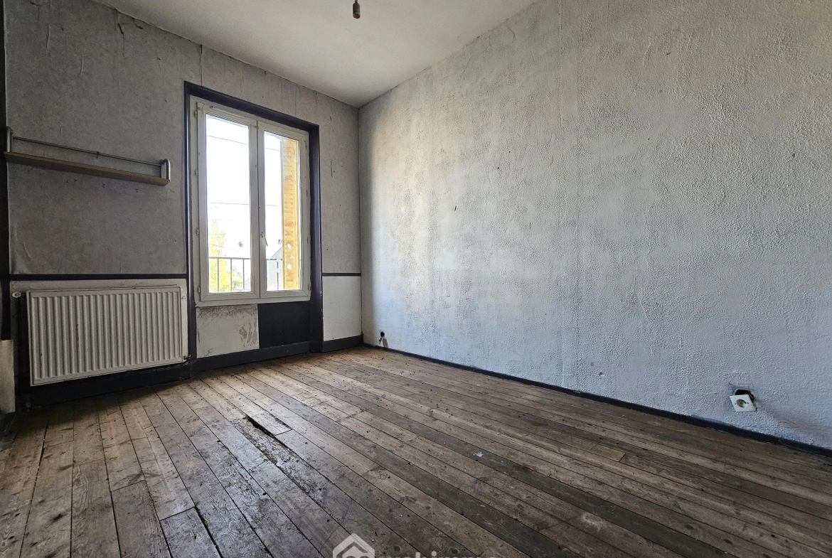 Maison à rénover de 95 m² à Sissonne avec grand terrain et potentiel 