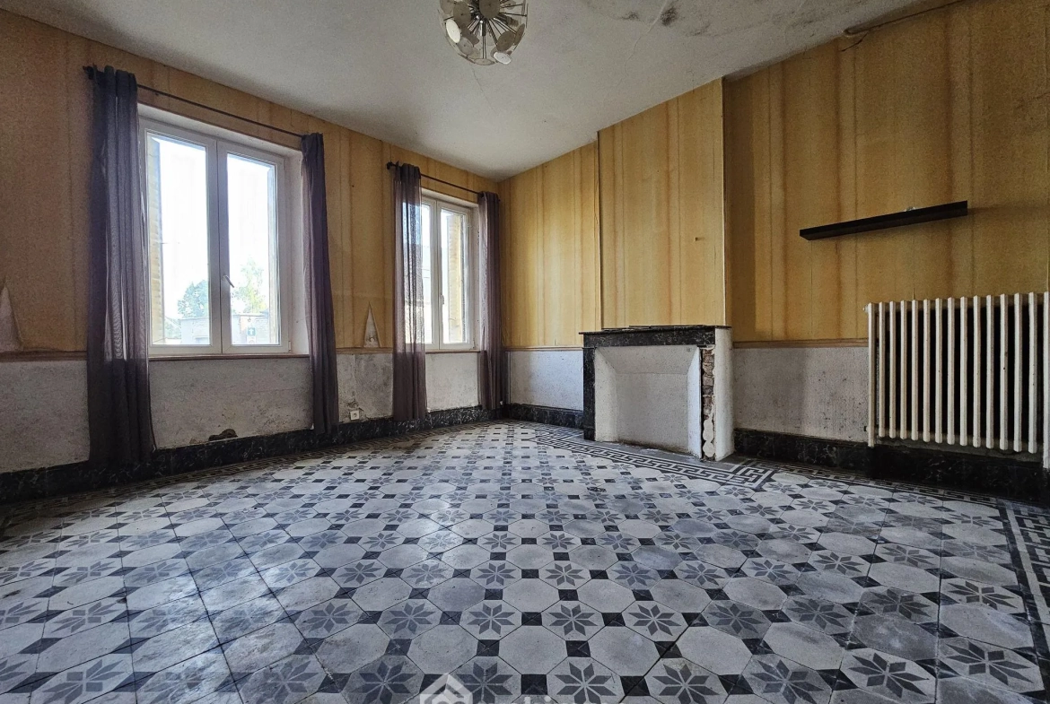 Maison à rénover de 95 m² à Sissonne avec grand terrain et potentiel 