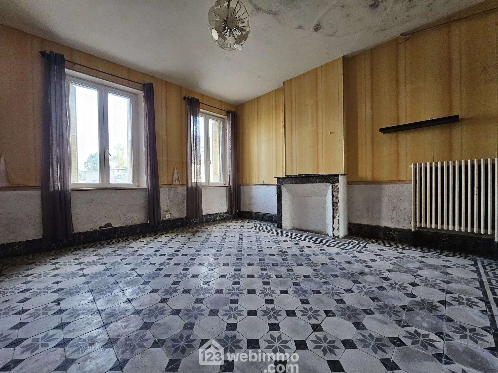 Maison à rénover de 95 m² à Sissonne avec grand terrain et potentiel 