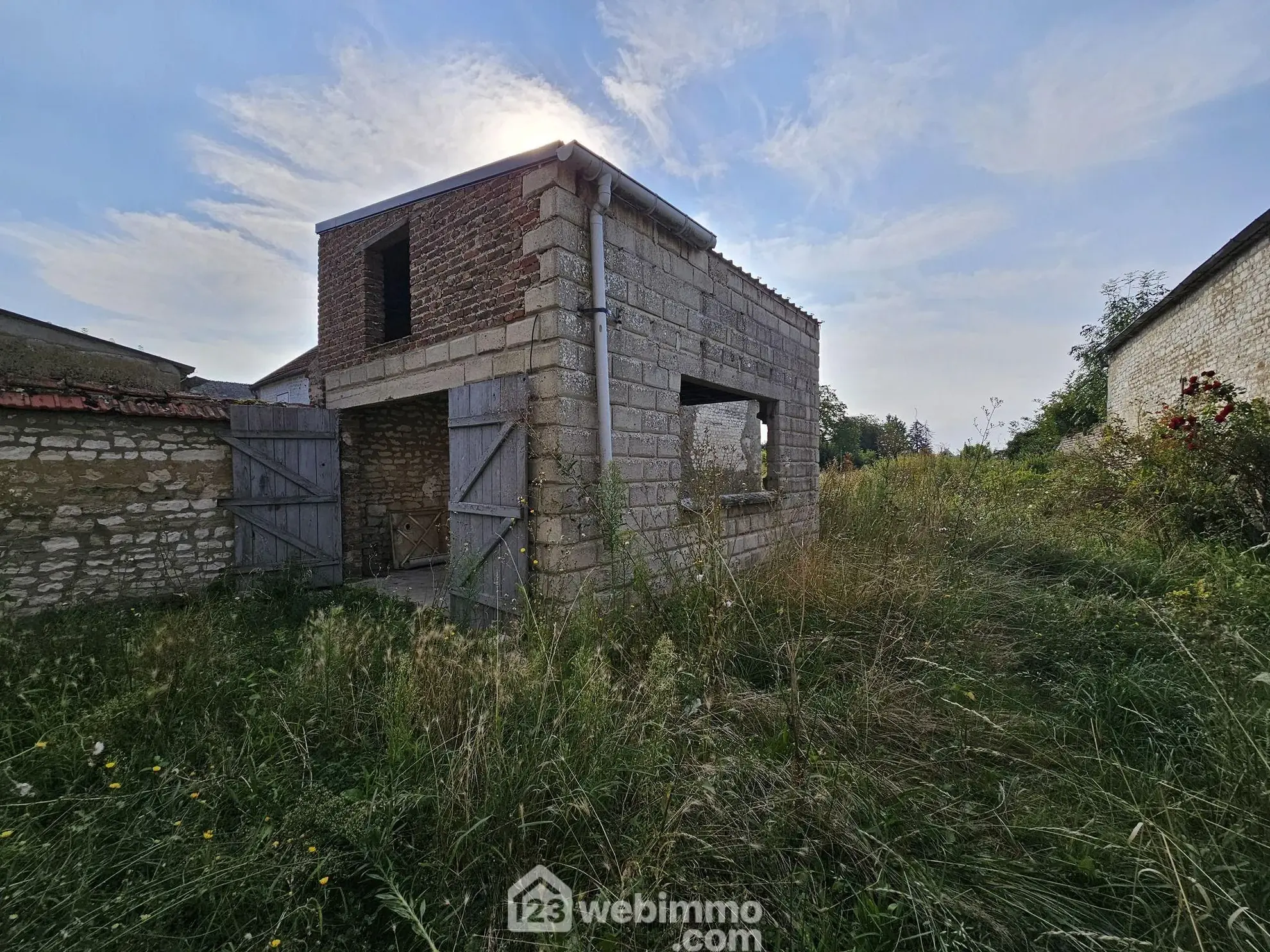 Maison à rénover de 95 m² à Sissonne avec grand terrain et potentiel 