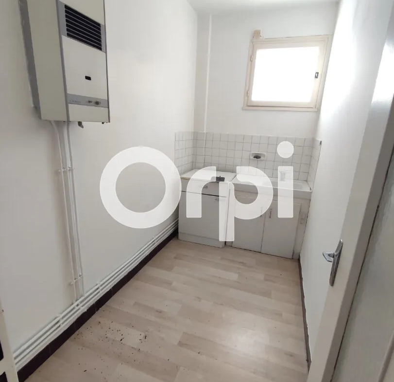 Appartement à Jurançon avec jardin, centre-ville, à rénover, belles possibilités 