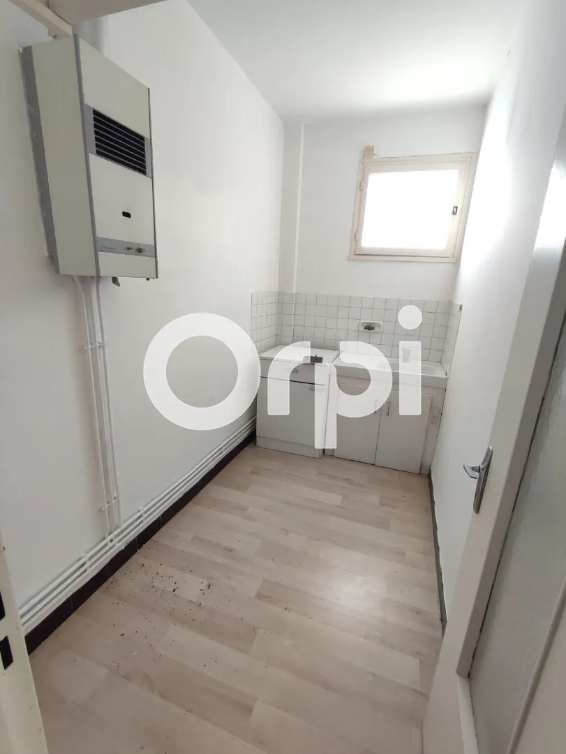 Appartement à Jurançon avec jardin, centre-ville, à rénover, belles possibilités 