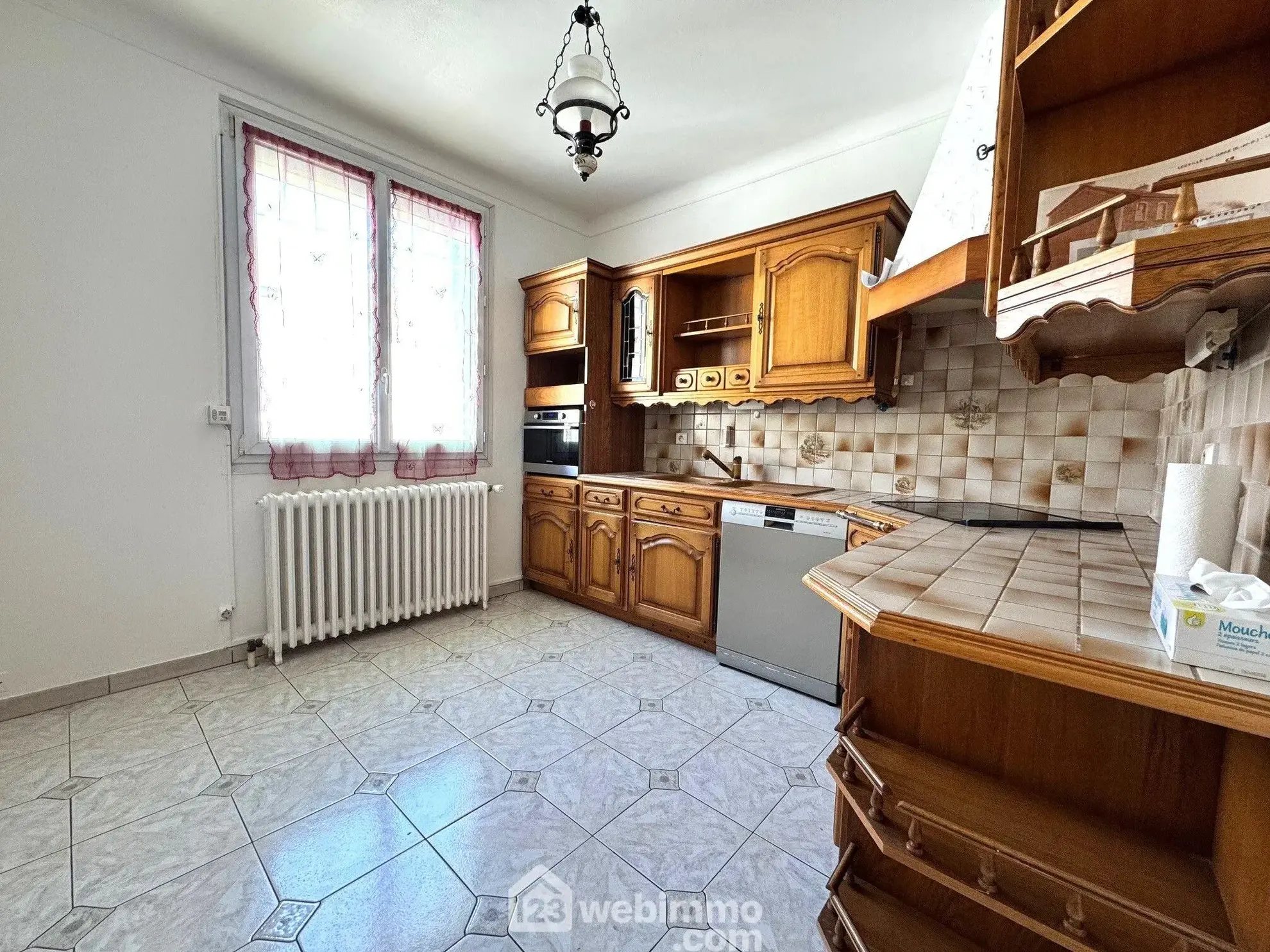 Maison de 81 m² à vendre à Leuville-sur-Orge en centre-ville, avec jardin et garage 