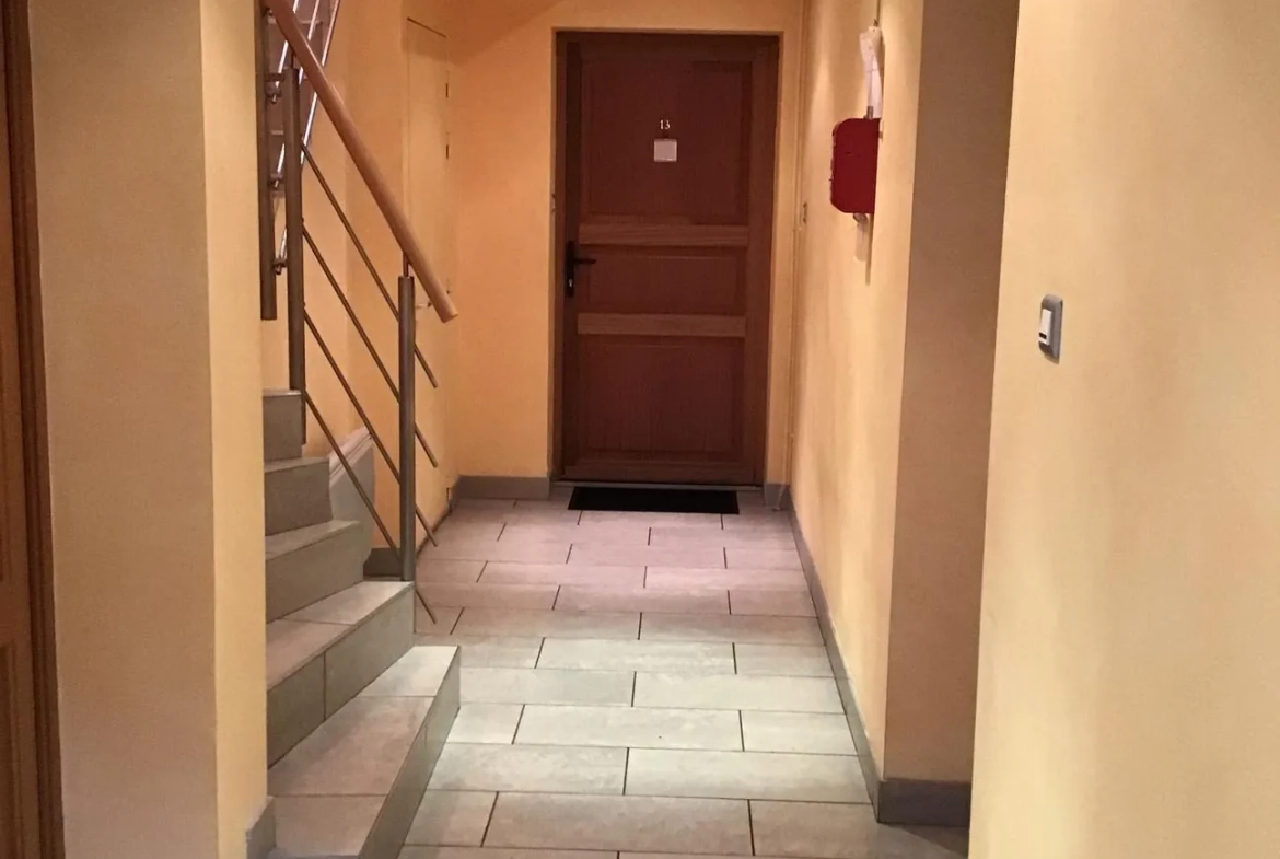 Appartement en rez-de-chaussée à Remiremont près du centre avec garage et terrasse 