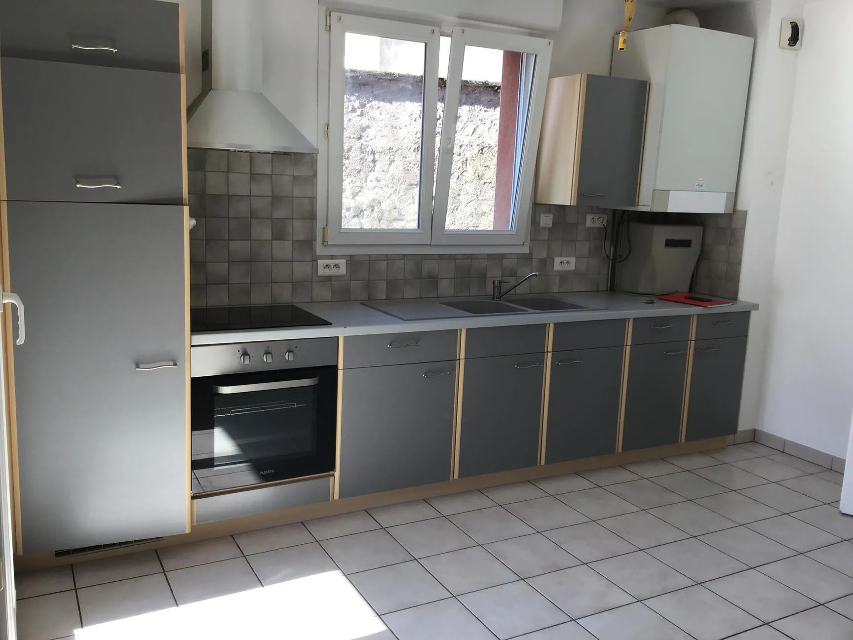 Appartement en rez-de-chaussée à Remiremont près du centre avec garage et terrasse 