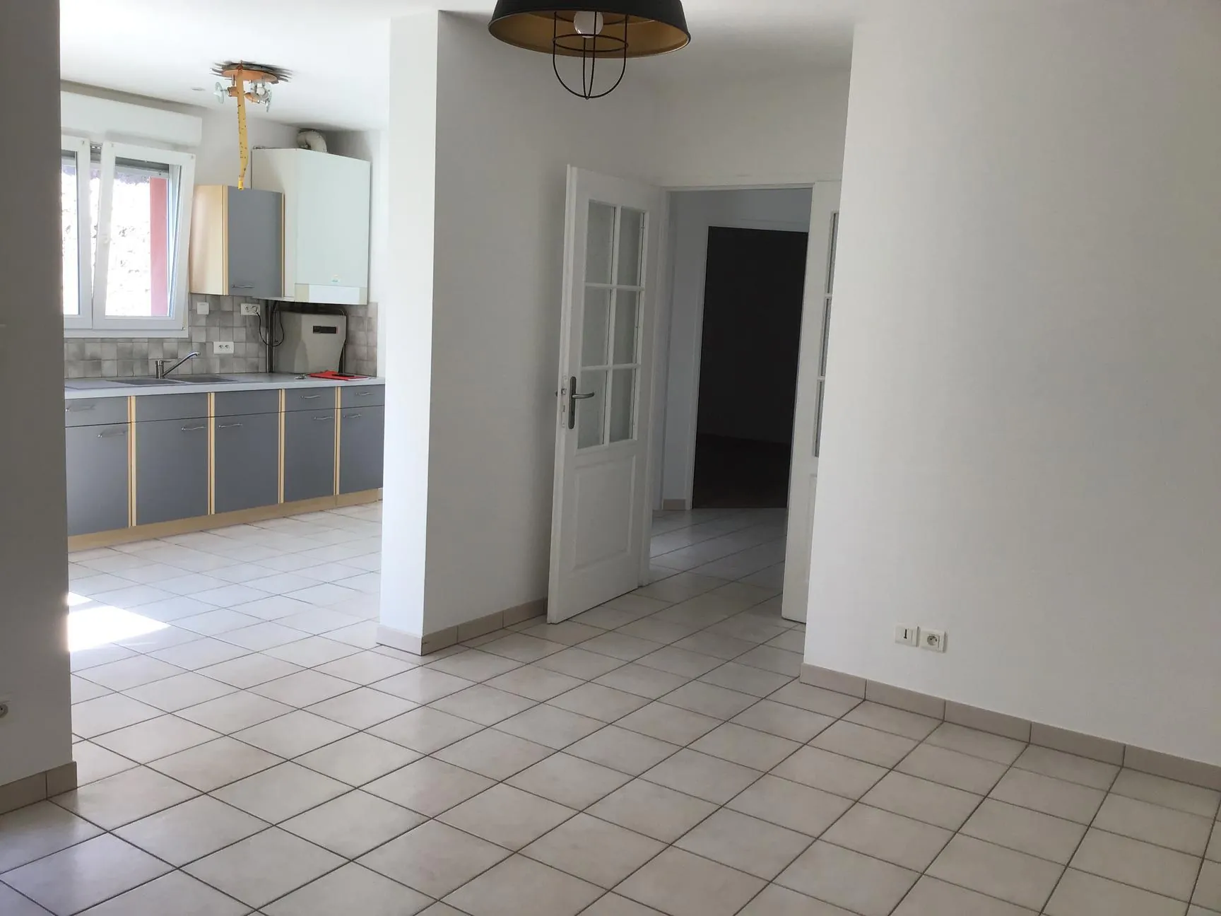 Appartement en rez-de-chaussée à Remiremont près du centre avec garage et terrasse 