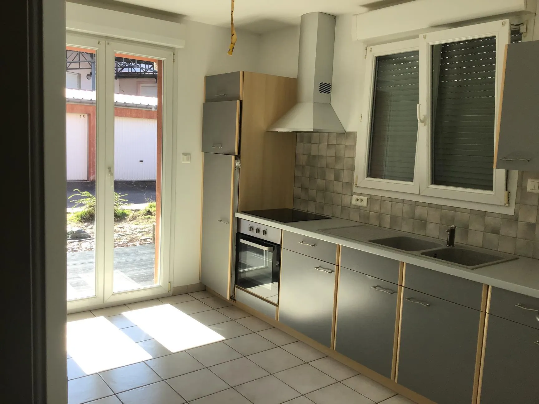 Appartement en rez-de-chaussée à Remiremont près du centre avec garage et terrasse 