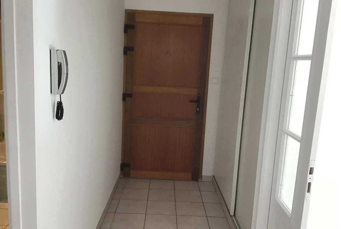 Appartement en rez-de-chaussée à Remiremont près du centre avec garage et terrasse 