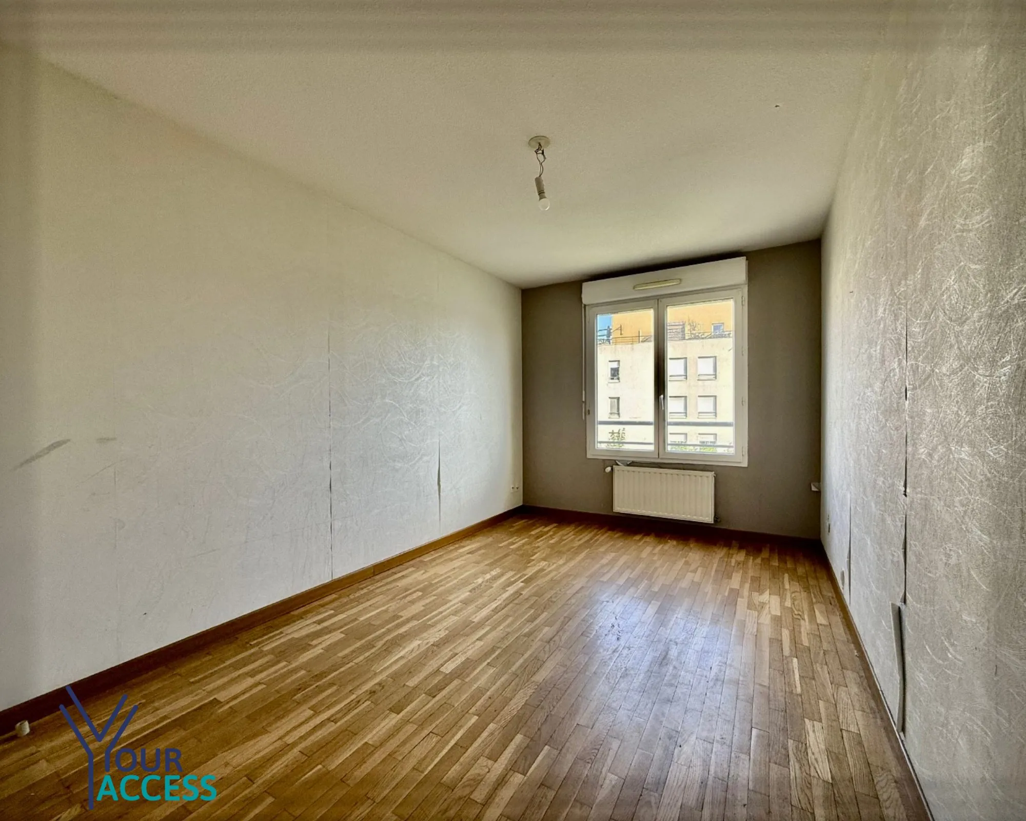Achat appartement T3 à Vénissieux avec balcon, cave et garage 