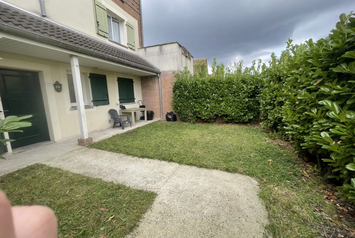 Appartement de plain-pied avec jardin et garage à Lys Les Lannoy 