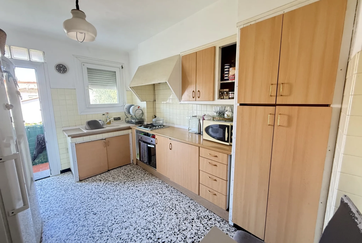 Investissement immobilier à Perpignan : immeuble en monopropriété avec 3 logements, jardin et parking 