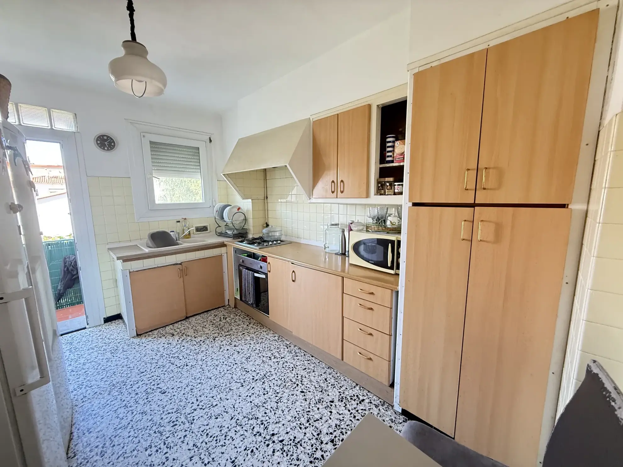 Investissement immobilier à Perpignan : immeuble en monopropriété avec 3 logements, jardin et parking 