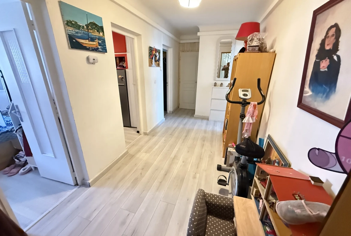 Investissement immobilier à Perpignan : immeuble en monopropriété avec 3 logements, jardin et parking 