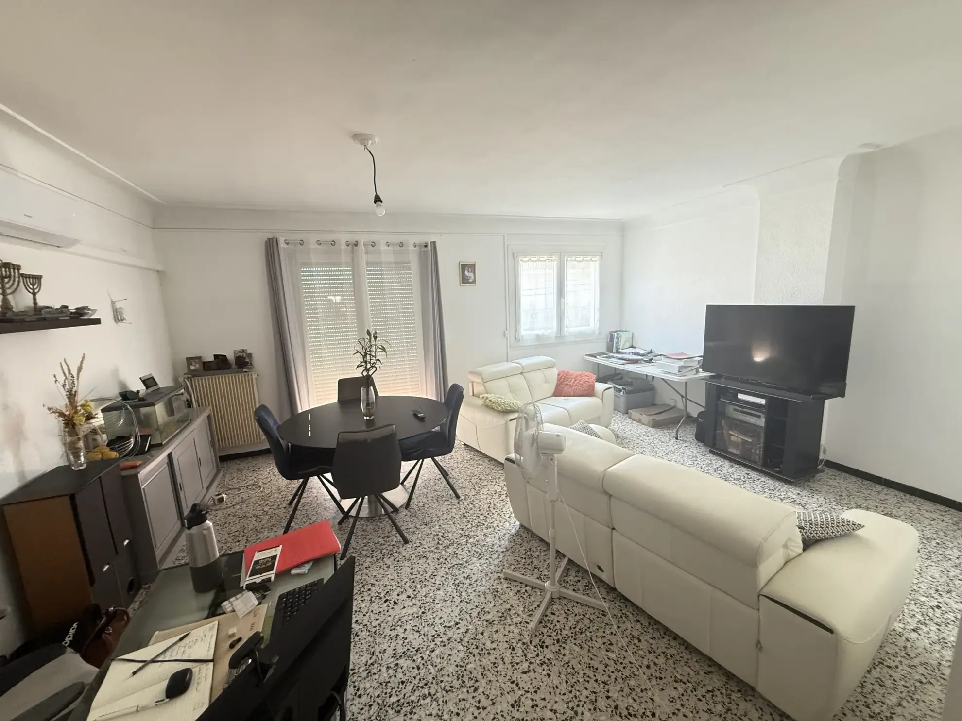 Investissement immobilier à Perpignan : immeuble en monopropriété avec 3 logements, jardin et parking 