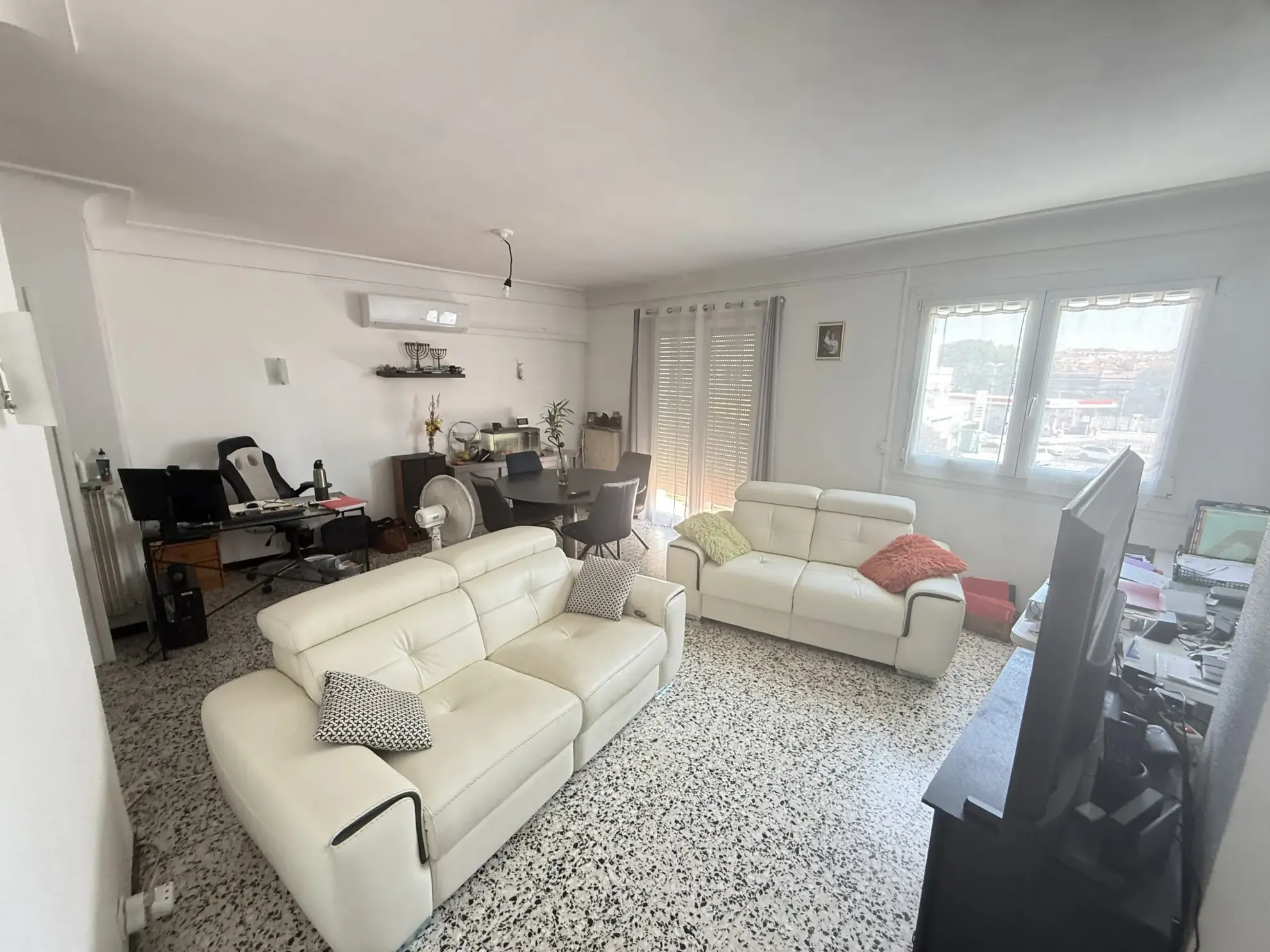 Investissement immobilier à Perpignan : immeuble en monopropriété avec 3 logements, jardin et parking 