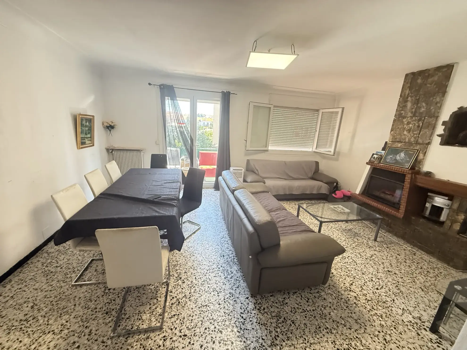 Investissement immobilier à Perpignan : immeuble en monopropriété avec 3 logements, jardin et parking 