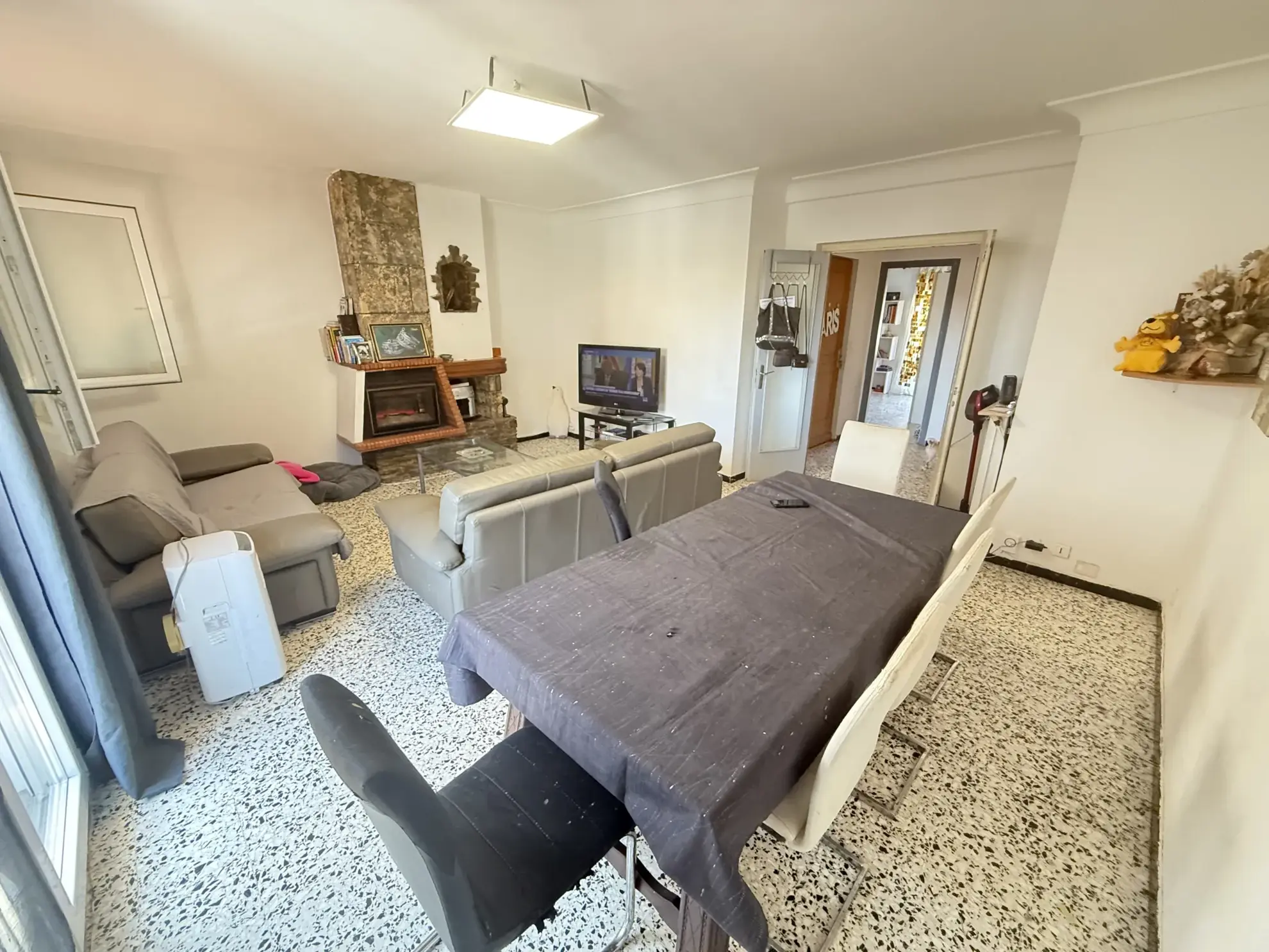 Investissement immobilier à Perpignan : immeuble en monopropriété avec 3 logements, jardin et parking 