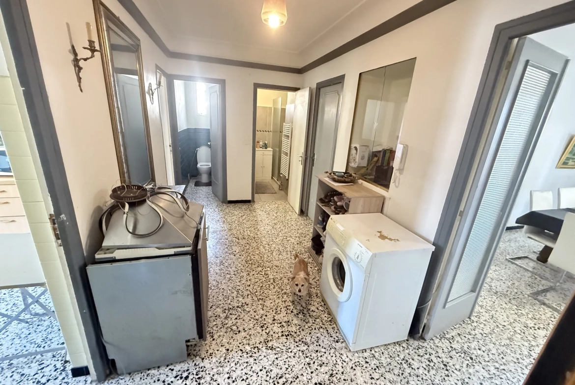 Investissement immobilier à Perpignan : immeuble en monopropriété avec 3 logements, jardin et parking 