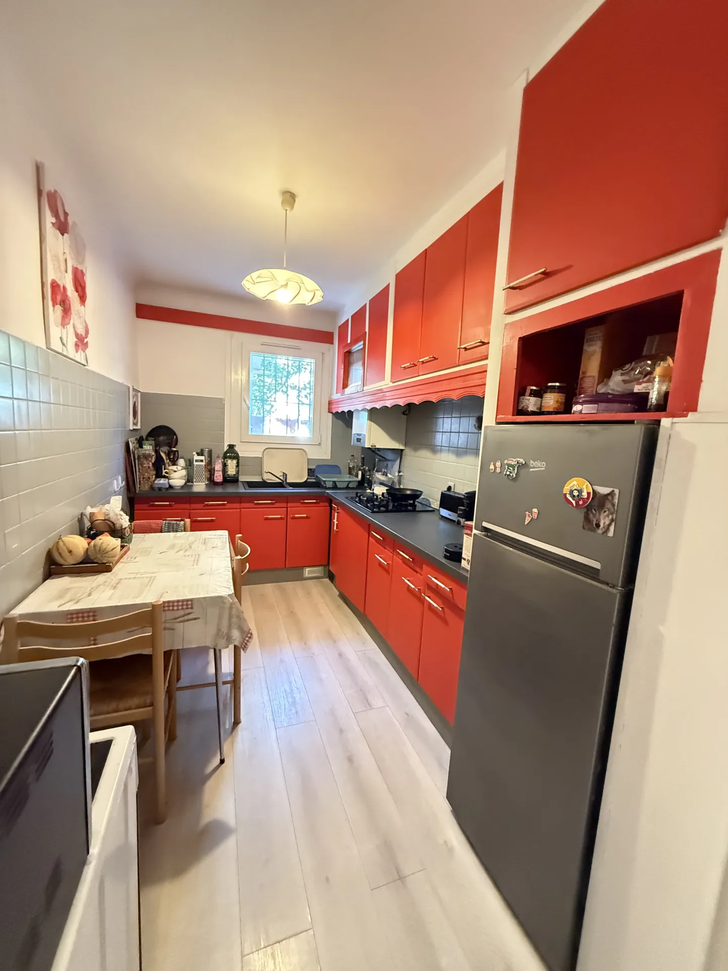 Investissement immobilier à Perpignan : immeuble en monopropriété avec 3 logements, jardin et parking 
