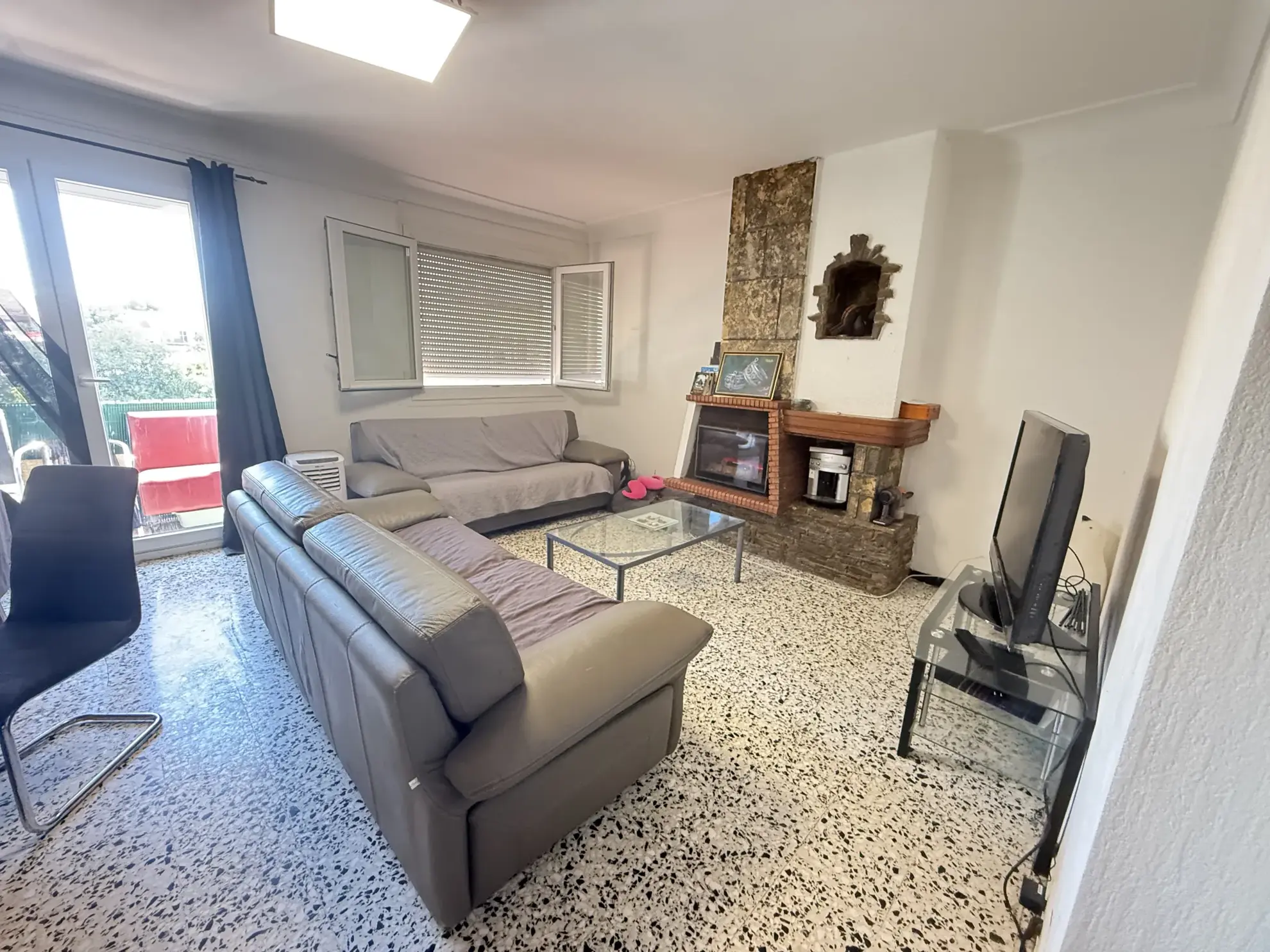 Investissement immobilier à Perpignan : immeuble en monopropriété avec 3 logements, jardin et parking 
