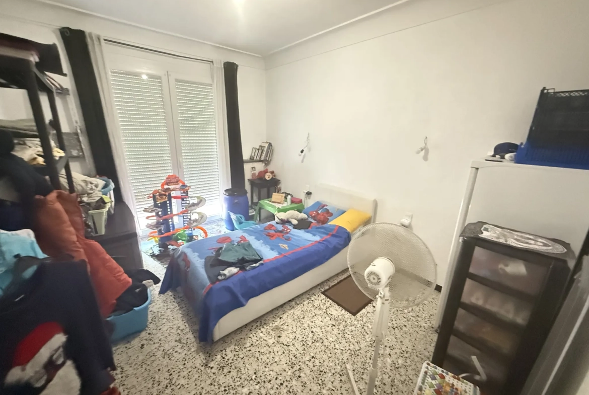Investissement immobilier à Perpignan : immeuble en monopropriété avec 3 logements, jardin et parking 