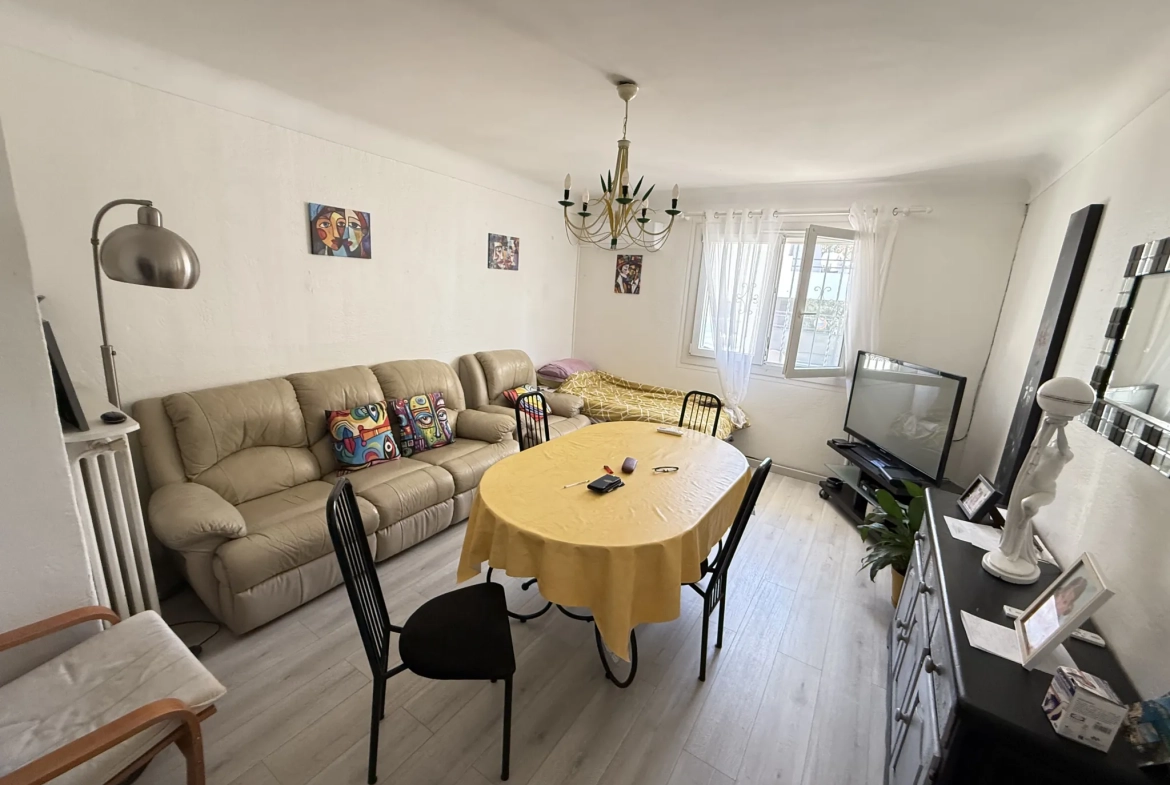 Investissement immobilier à Perpignan : immeuble en monopropriété avec 3 logements, jardin et parking 