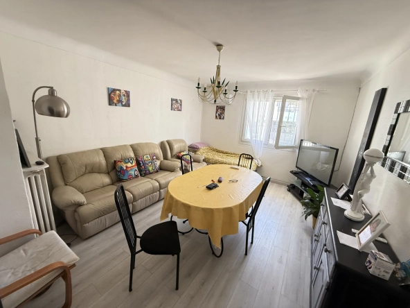 Investissement immobilier à Perpignan : immeuble en monopropriété avec 3 logements, jardin et parking