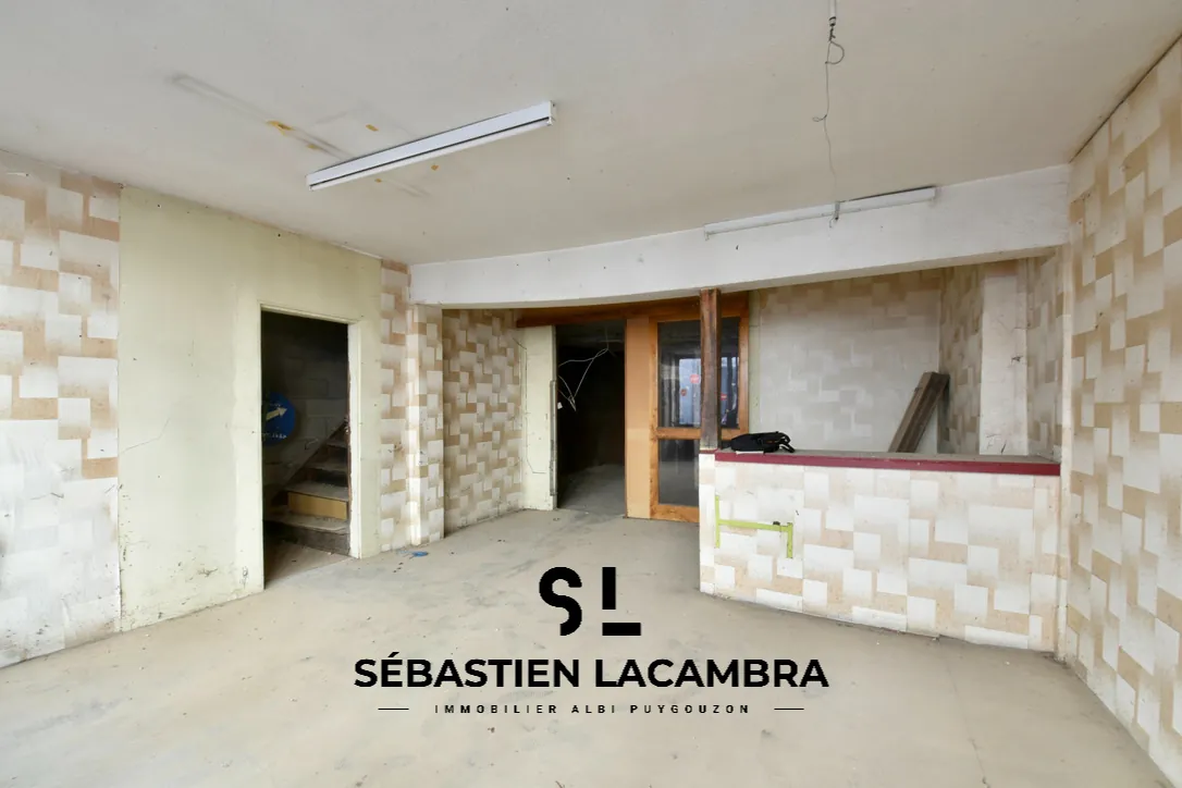 Immeuble à rénover de 230 m² au centre de Realmont avec cachet et potentiel d’aménagement 