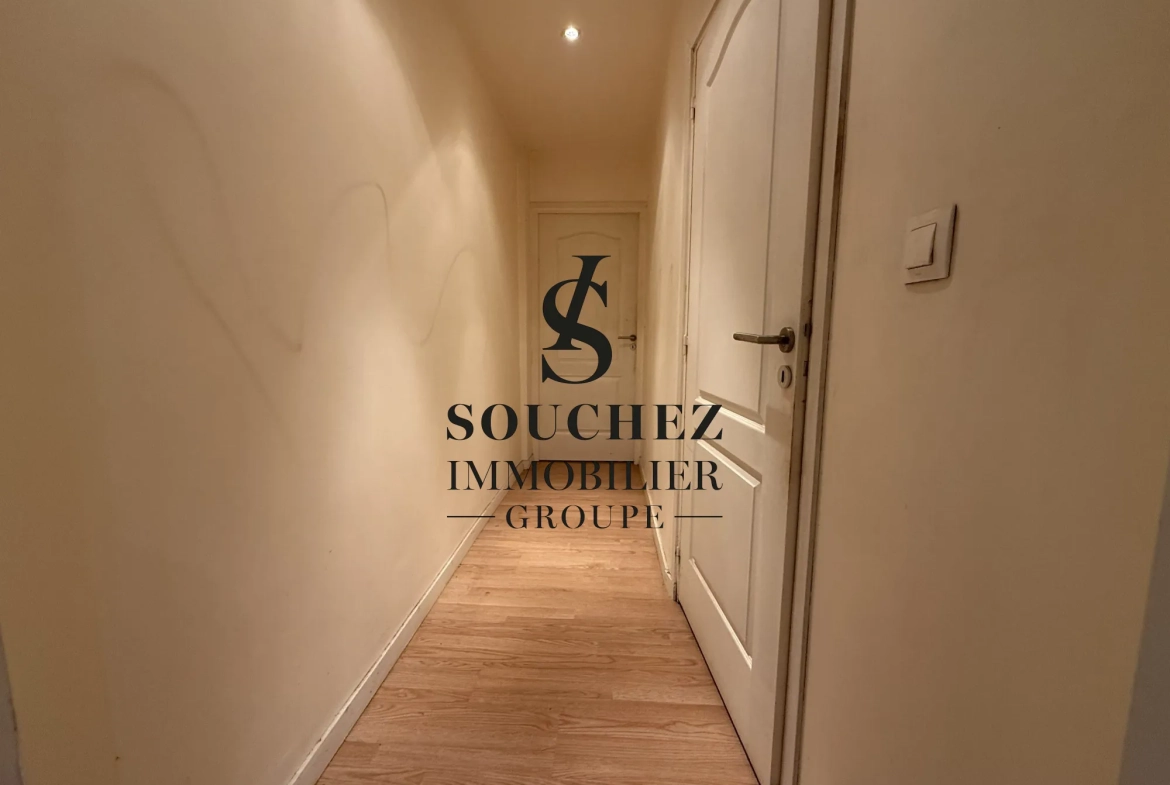 Appartement à rénover de 50m2 avec parking et cave à Sainte-Catherine 