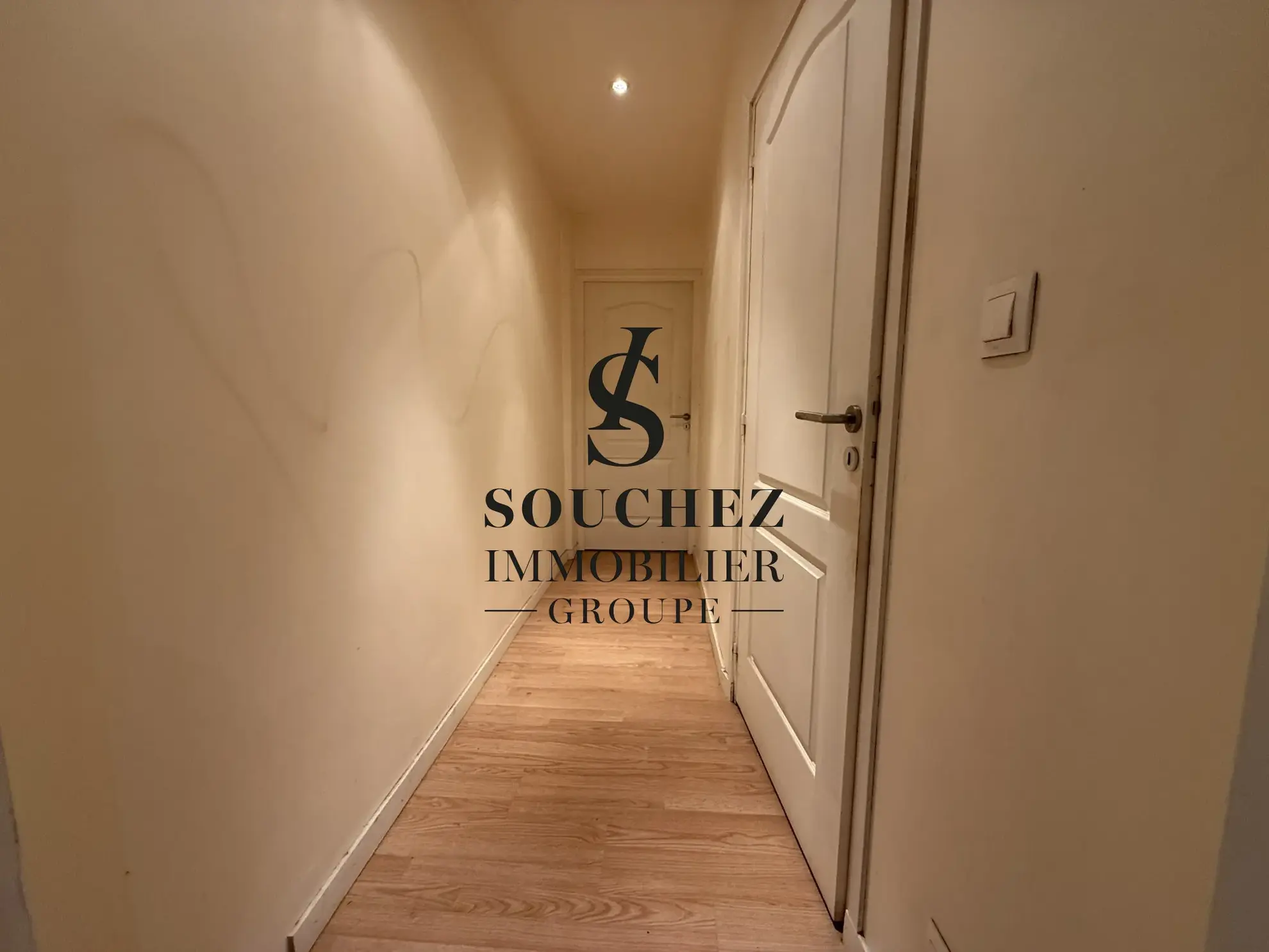 Appartement à rénover de 50m2 avec parking et cave à Sainte-Catherine 