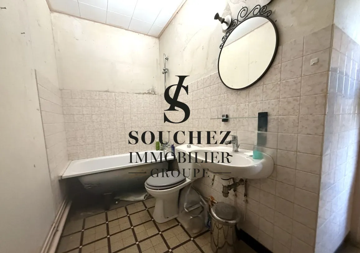 Appartement à rénover de 50m2 avec parking et cave à Sainte-Catherine 