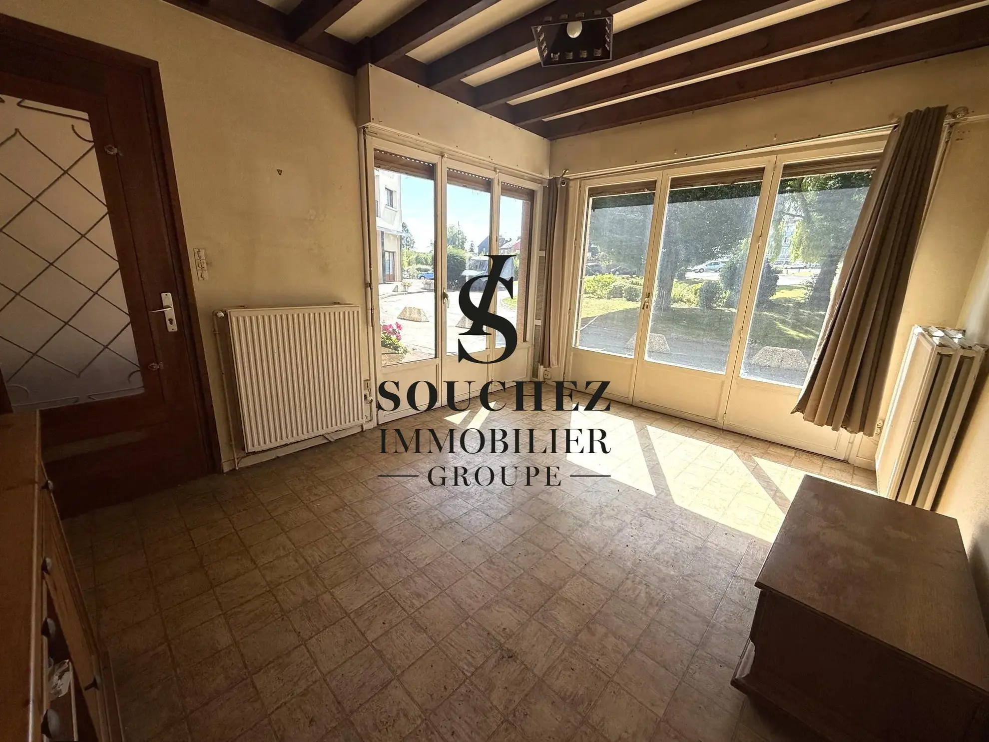 Appartement à rénover de 50m2 avec parking et cave à Sainte-Catherine 