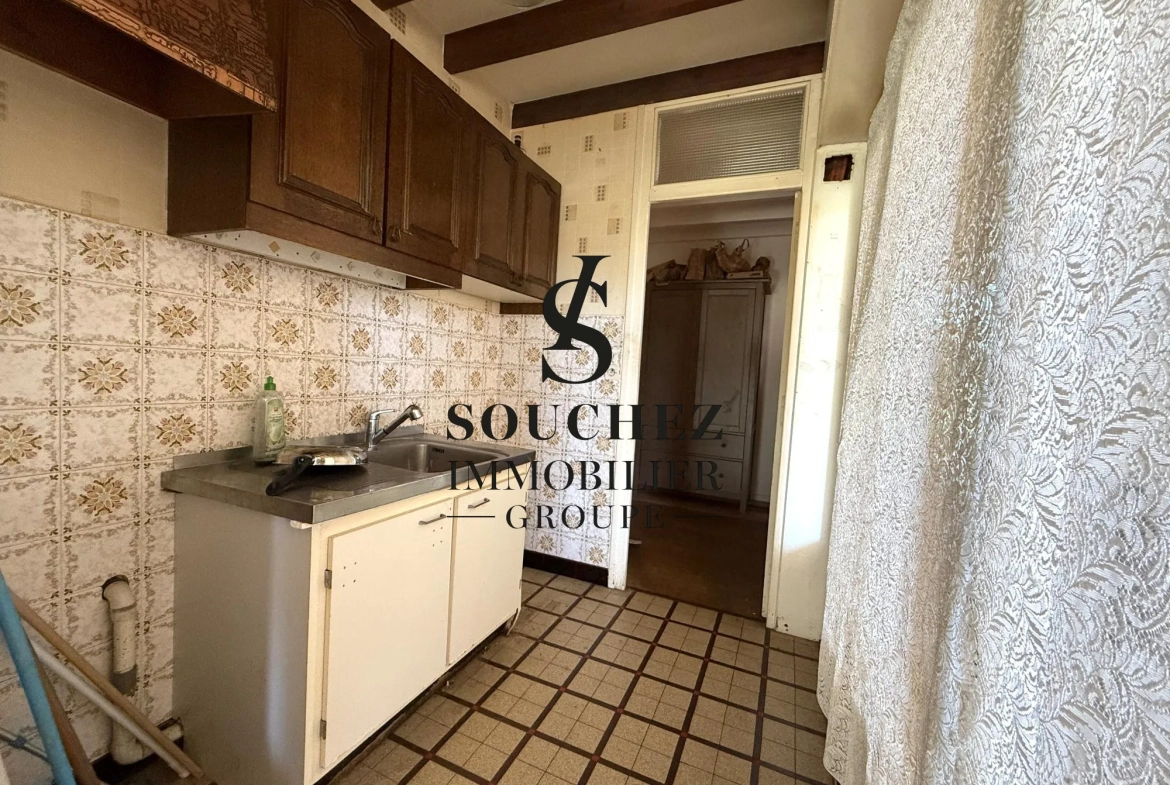 Appartement à rénover de 50m2 avec parking et cave à Sainte-Catherine 