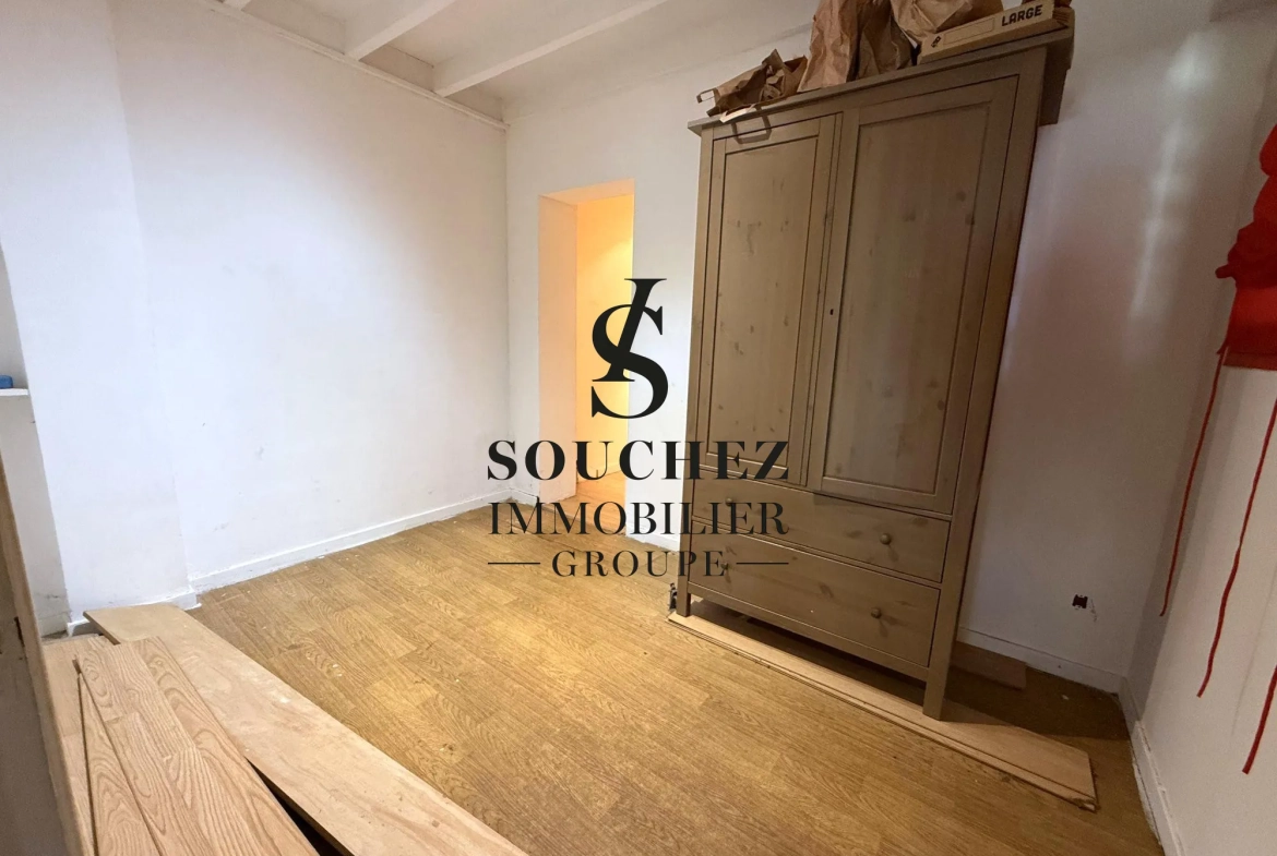 Appartement à rénover de 50m2 avec parking et cave à Sainte-Catherine 