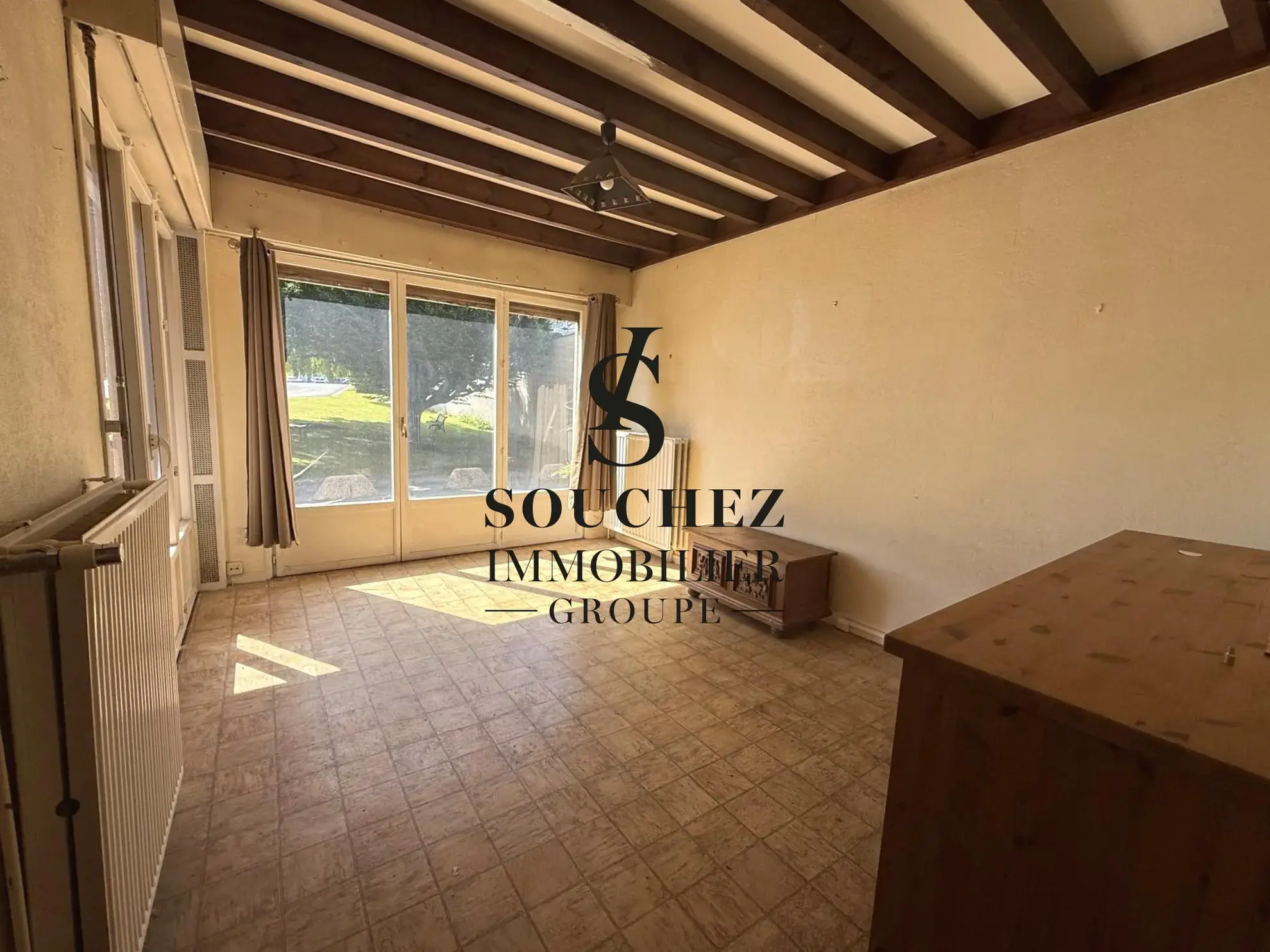 Appartement à rénover de 50m2 avec parking et cave à Sainte-Catherine 