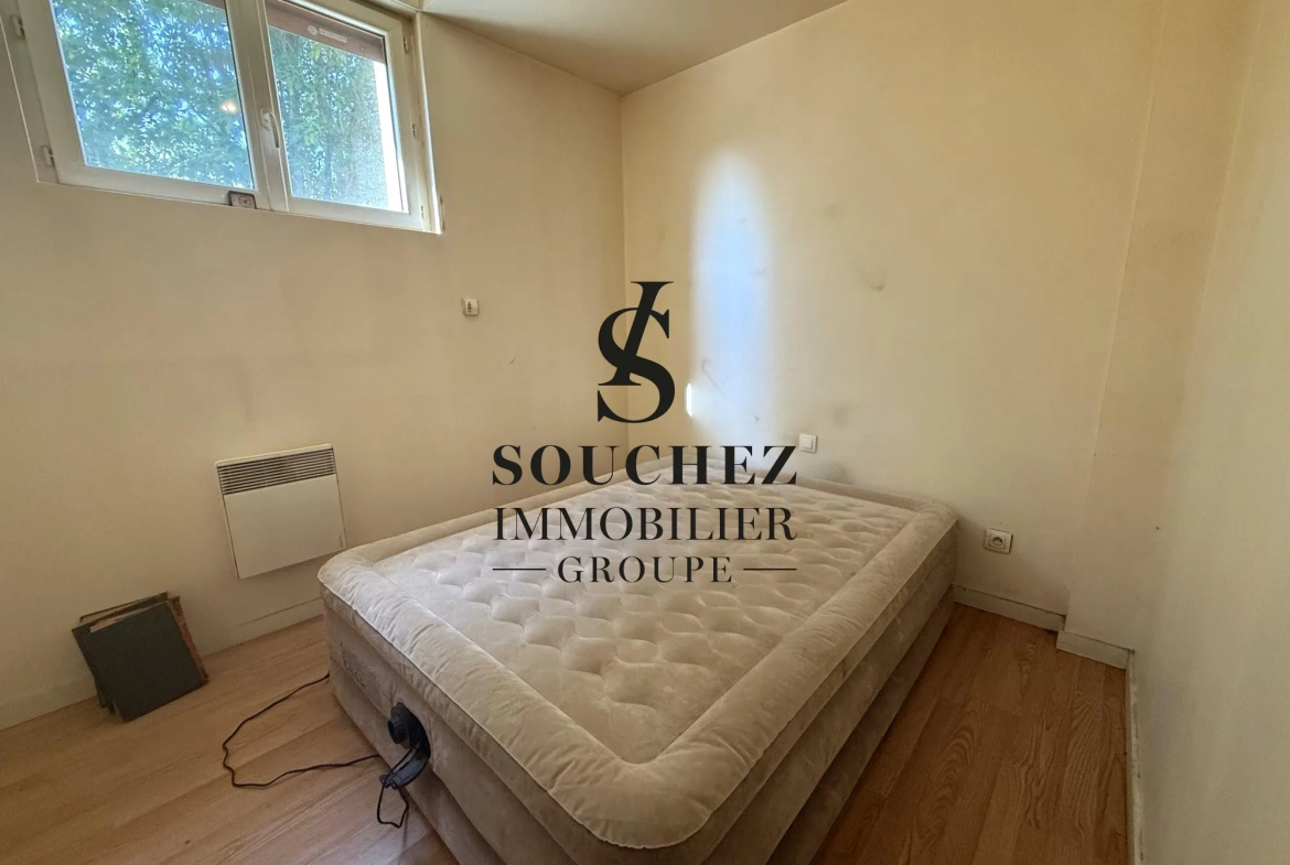 Appartement à rénover de 50m2 avec parking et cave à Sainte-Catherine 