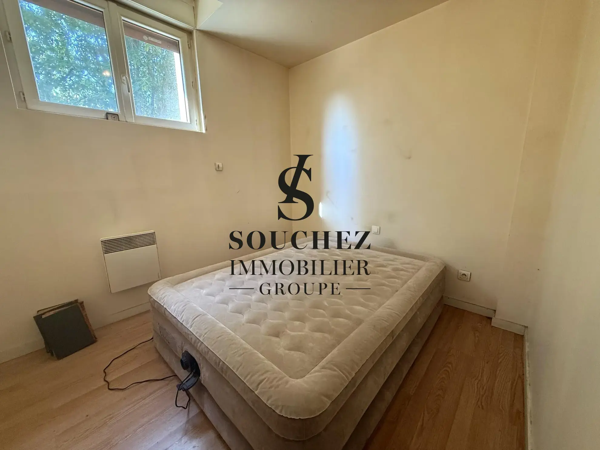 Appartement à rénover de 50m2 avec parking et cave à Sainte-Catherine 