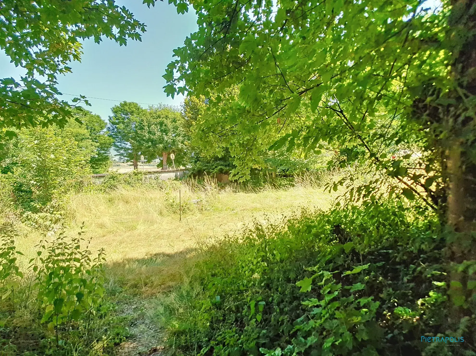 Terrain constructible de 1466 m² à Châtonnay avec projet de maison modulable 