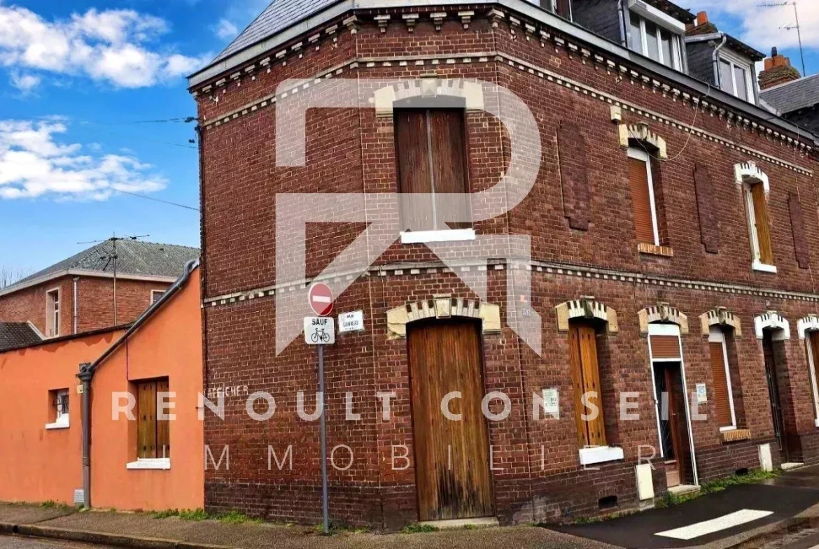 Maison de ville à Sotteville-lès-Rouen avec jardin et garage - Opportunité à saisir 