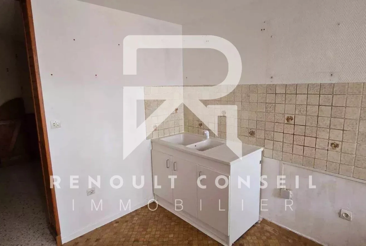 Maison de ville à Sotteville-lès-Rouen avec jardin et garage - Opportunité à saisir 