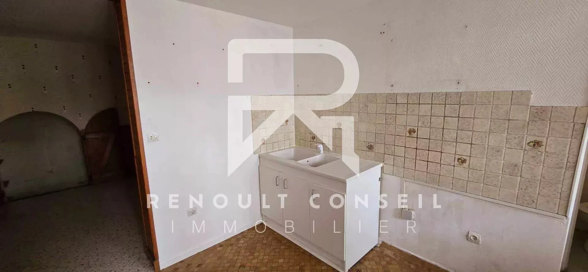 Maison de ville à Sotteville-lès-Rouen avec jardin et garage - Opportunité à saisir 