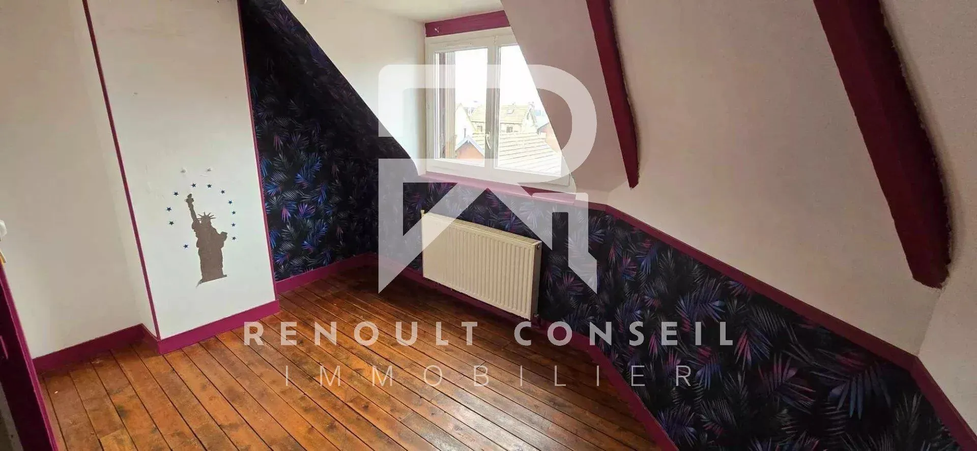 Maison de ville à Sotteville-lès-Rouen avec jardin et garage - Opportunité à saisir 