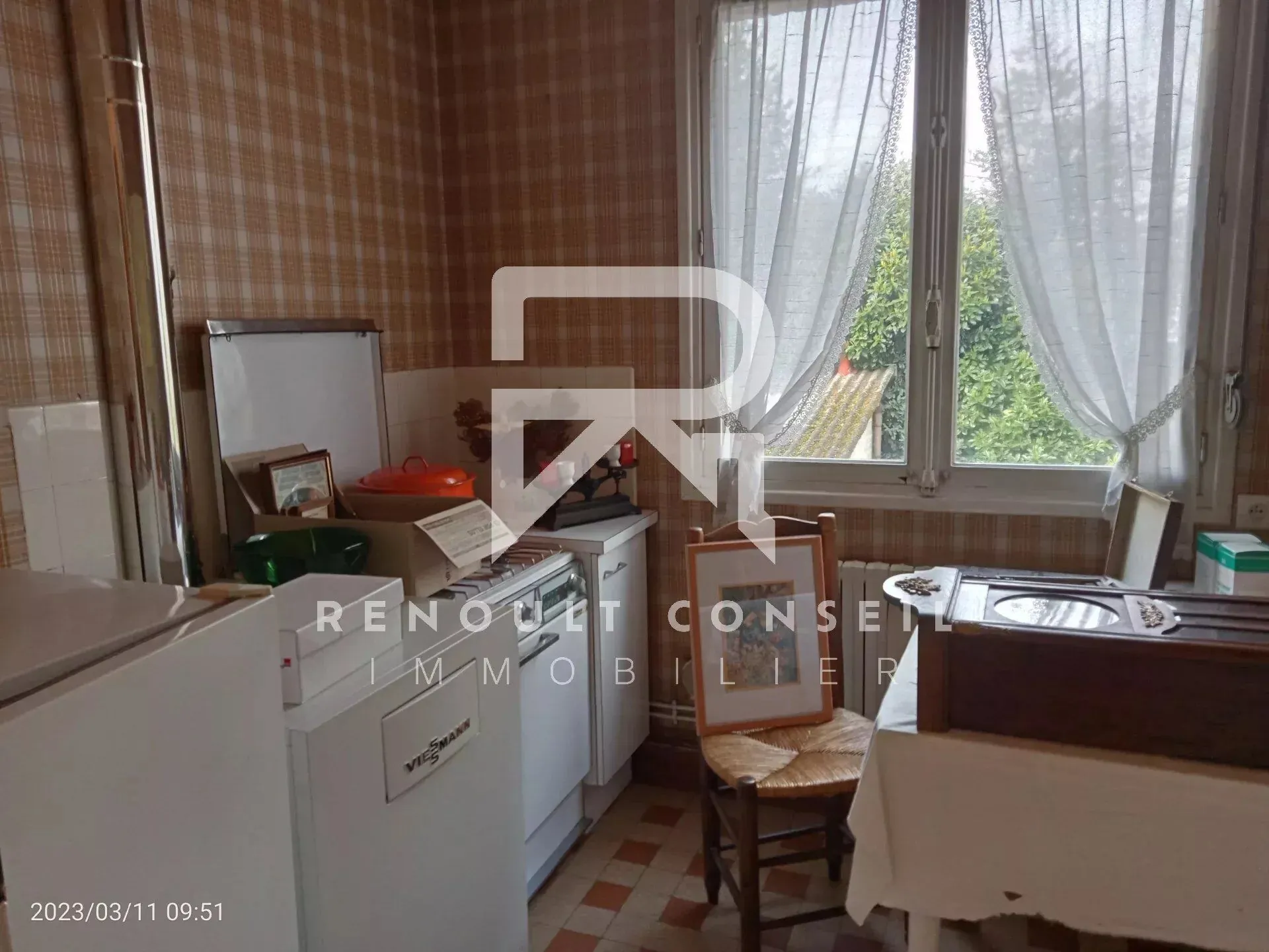 Appartement de 65 m² à Elbeuf à rafraîchir, proche du centre-ville 